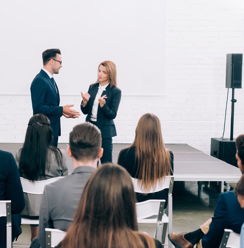 Two PTZ cameras with controller on a desk